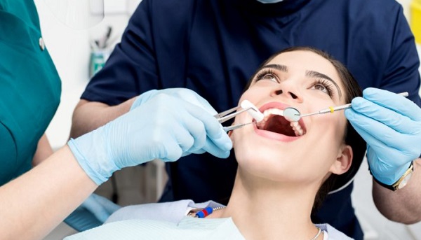 Tái khám định kỳ để kịp thời xử lý các vấn đề về răng miệng